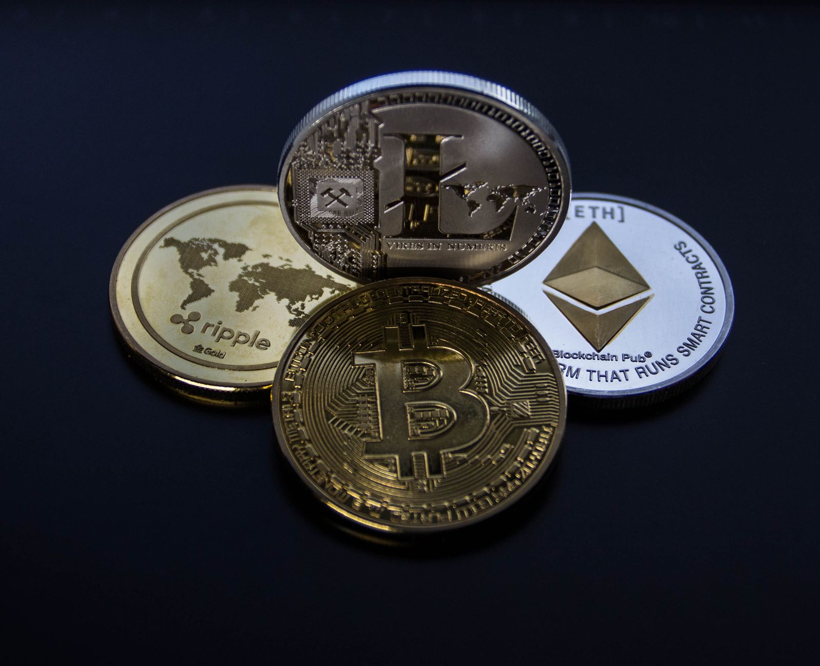 Bitcoin and Ethereum coins representing the regulated crypto economy